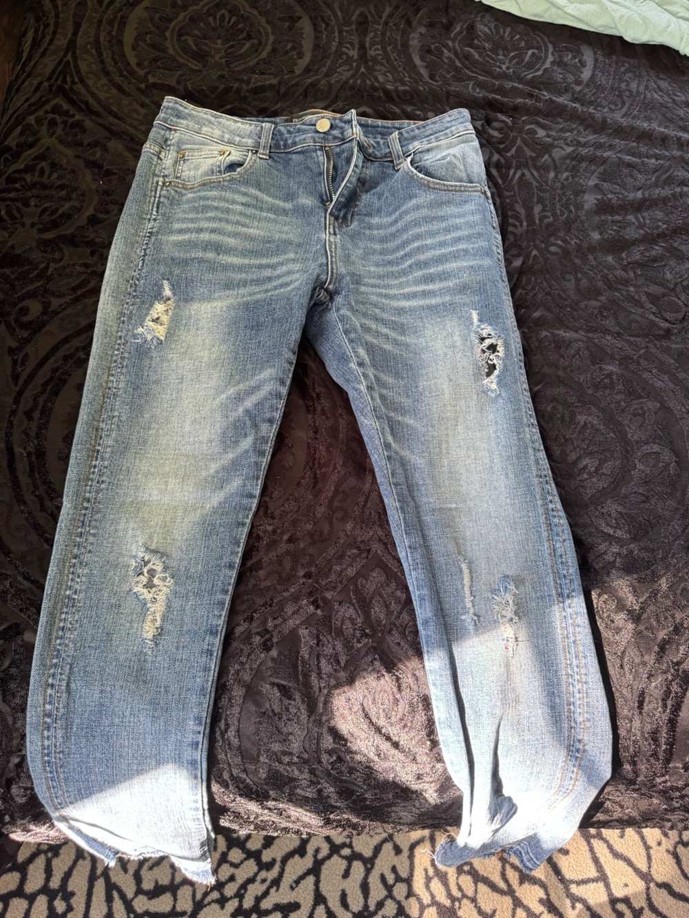 Prime rose Path men’s distressed denim jeans.